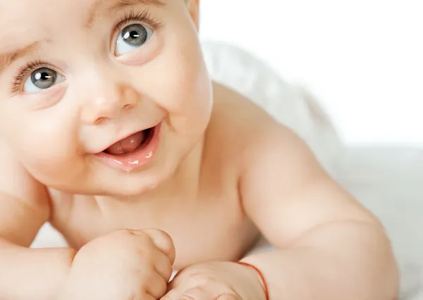 Γλυκό μωρό πρόσωπο χαμογελά Εικόνα Αρχείου