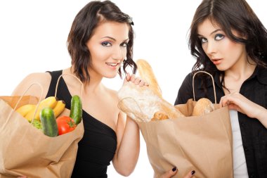 Females holding shooping bags groceries clipart
