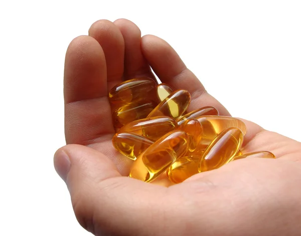 Handfull av omega-3 kapslar — Stockfoto