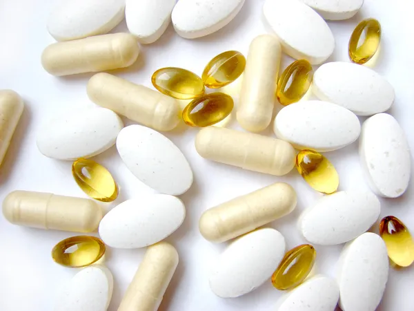 Pills and tablets of supplements — Stock Photo, Image