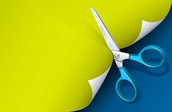 Scissors cutting paper