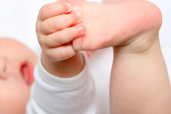Νεογέννητο πόδι μωρού Εικόνα Αρχείου