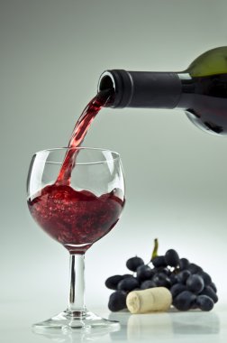 Red wine with grapes clipart