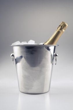 Champagne bottle in ice bucket clipart