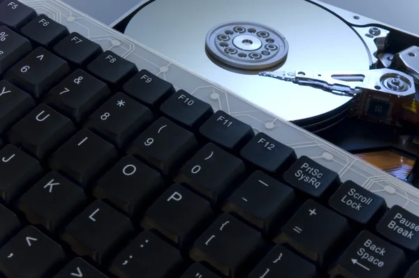 stock image Hard disk close up on keyboard