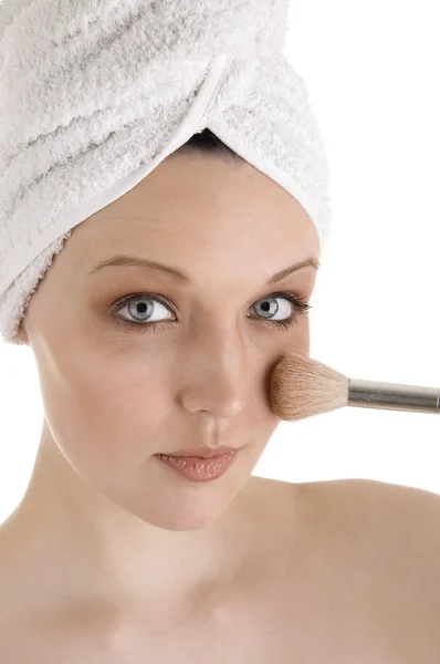 Žena aplikující make-up Stock Fotografie