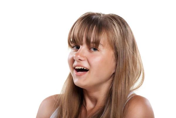 Щаслива дівчина-підліток сміється на білому тлі — стокове фото
