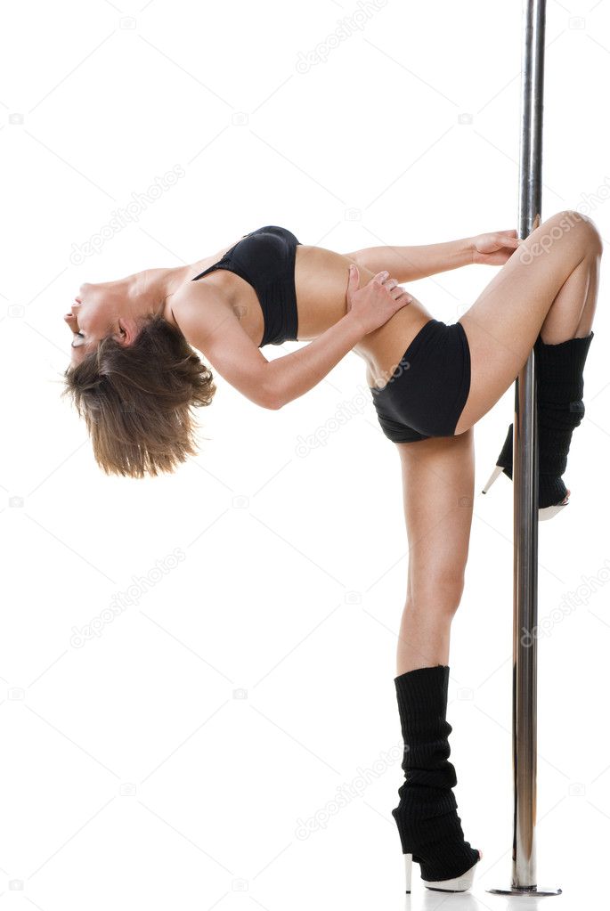 Young sexy woman exercise pole dance against a white background
