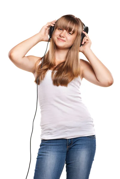 Belle fille écoutant une musique dans les écouteurs — Photo