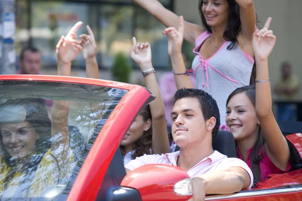 Happy group of friends in the car — Stock Photo, Image