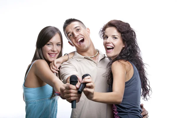 Happy group of friends laughing, cheering and waving — Stock Photo, Image