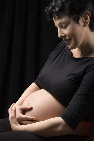 Uma mãe grávida — Fotografia de Stock
