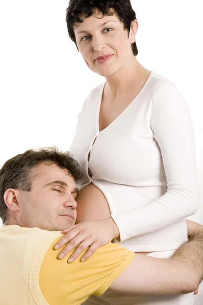 Happy young family expecting their first child — Stock Photo, Image