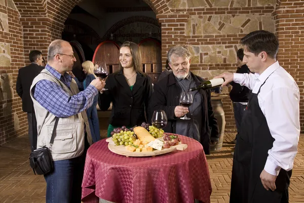 Celebration and tasting wine in the winery — Stock Photo, Image