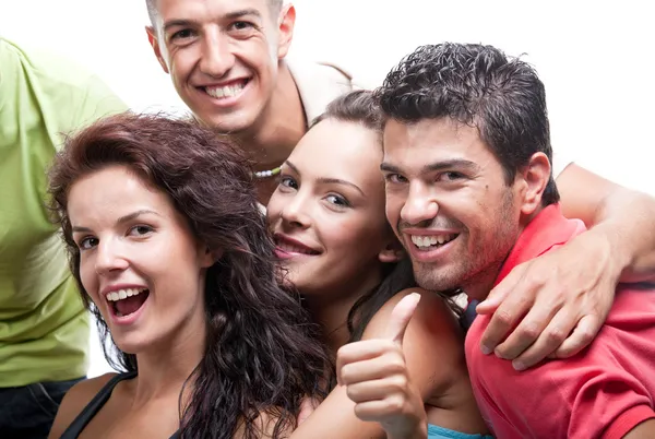 Happy group of friends laughing, cheering and waving Stock Image