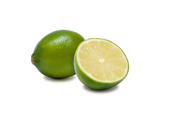 Yarım limon ile bir bütün kireç — Stok fotoğraf