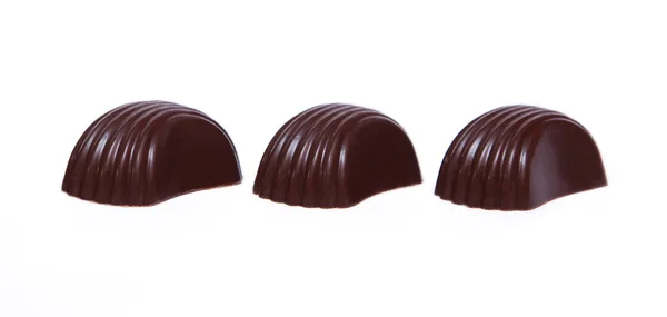 Three chokolate candies — Stock Photo, Image