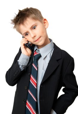 Kid talking on a cell phone clipart