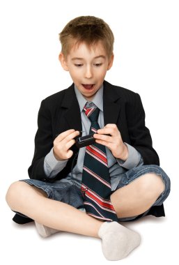 Surprised boy with cell phone clipart