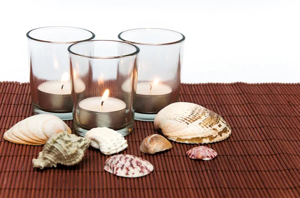 Svíčky s mušlemi — Stock fotografie