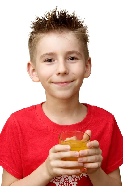 Мальчик со стаканом сока — стоковое фото
