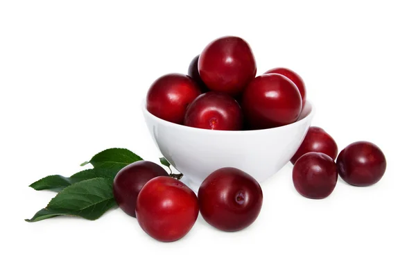Bowl of plums — Stock Photo, Image