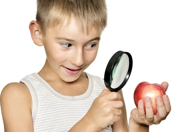 Boy with magnifying glass — Stock Photo, Image