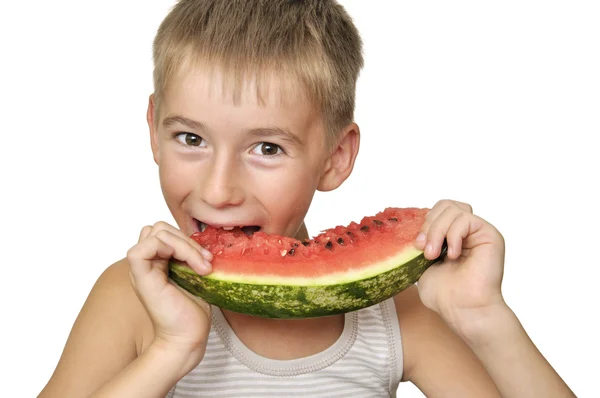 Boy eating watermelon — Stockfoto