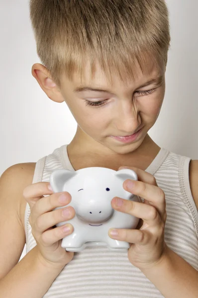 Boy with piggy bank — Stock Photo, Image
