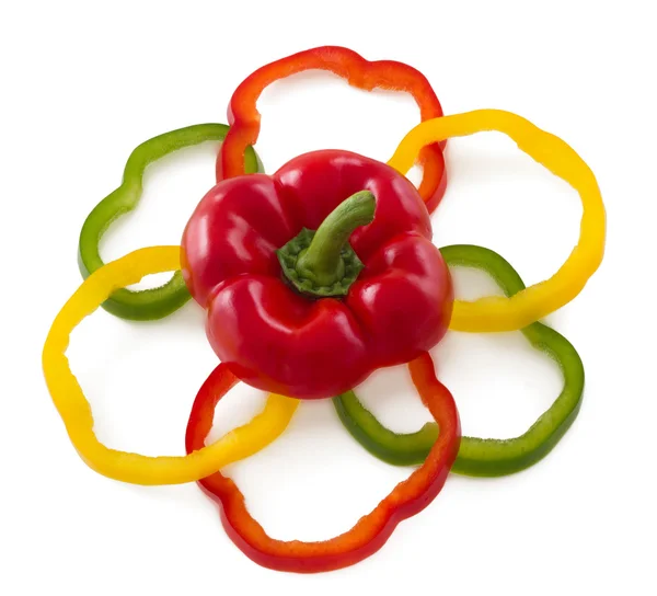 Skivad paprika ordna i blomma form. — Stockfoto