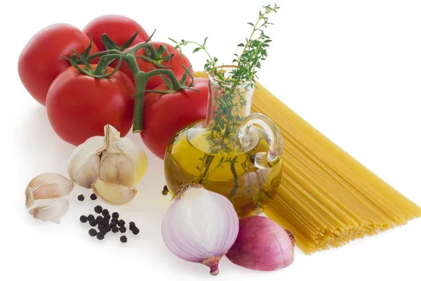 Pasta and ingredients on white — Stock Photo, Image