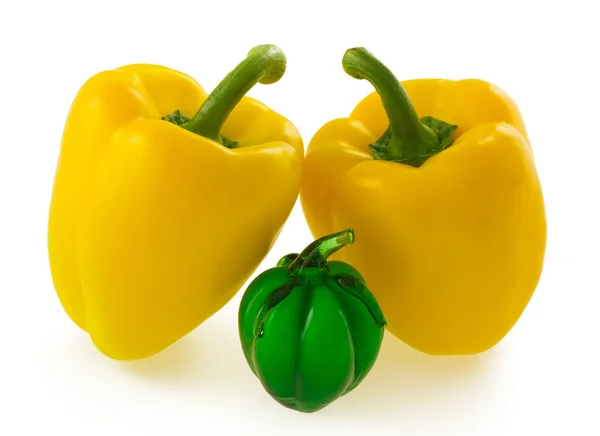Two yellow bell pepper and green pepper ornament — Stock Photo, Image
