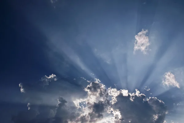 stock image Sunshine light through the evening clouds