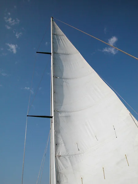 White sail against blue sky — Stock Photo, Image