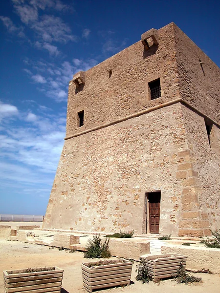 stock image Fortified tower on blue sky