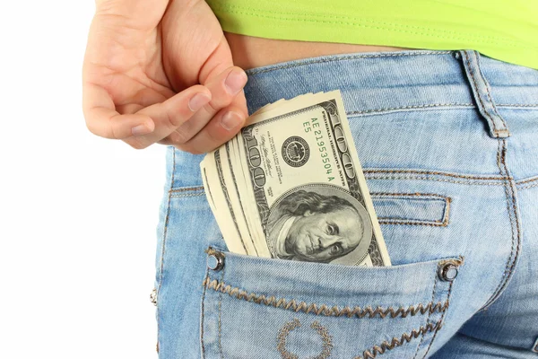 Hand pulling dollars money out from jeans pocket — Stock Photo, Image