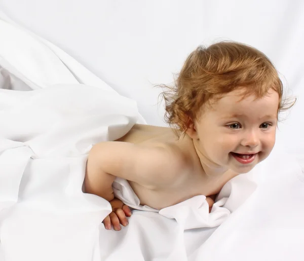 Smiling baby after bath Stock Image