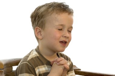 Little boy praying clipart