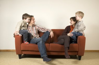 Family On A Couch 1 clipart