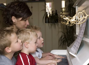 Family playing piano clipart