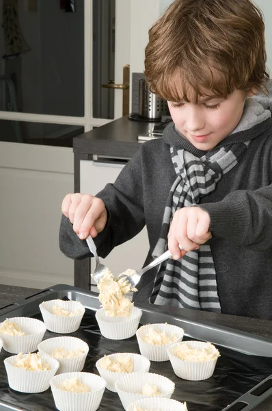 Kid Filling Cakecups With Dough — Stock Photo, Image