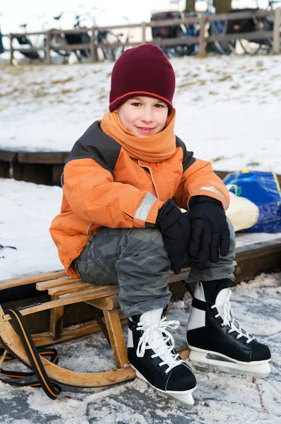 Little boy on a sled — Stock Photo, Image