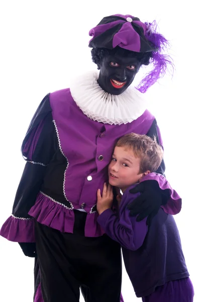 Zwarte piet mit Kind — Stockfoto