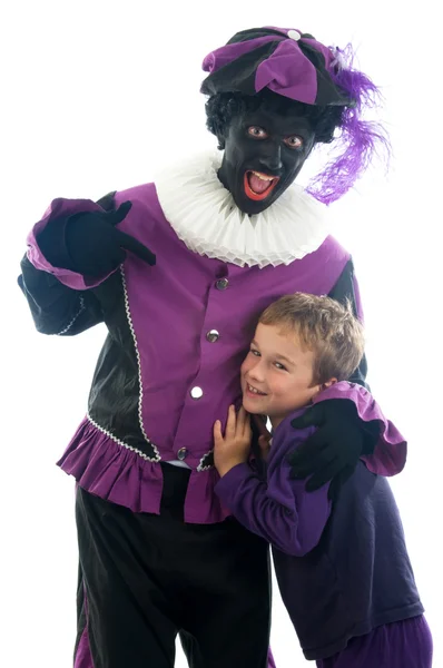 Zwarte piet z dzieckiem — Zdjęcie stockowe