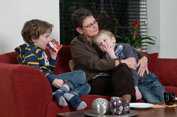Family in a livingroom — Stock Photo, Image