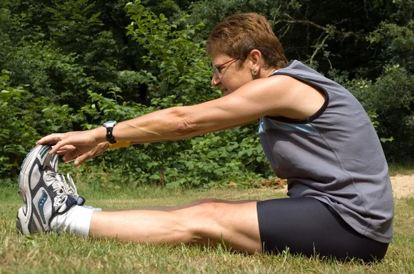 Stretching Woman — Stock Photo, Image