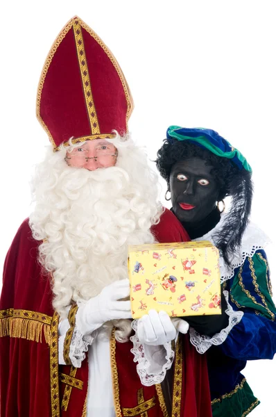 Saint Nicholas and his helper — Stock Photo, Image
