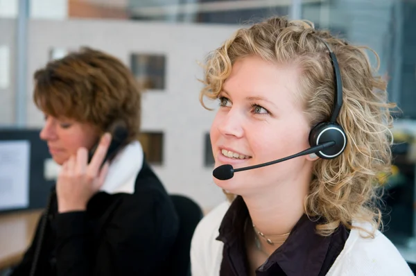 Front desk workers — Stock Photo, Image