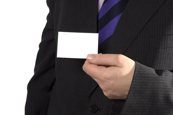 Um homem de negócios com um cartão em branco — Fotografia de Stock