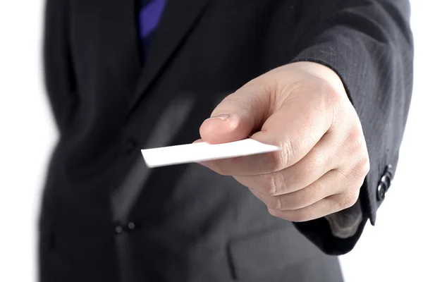 Um homem de negócios com um cartão em branco — Fotografia de Stock
